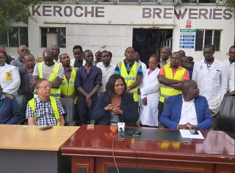 Keroche Breweries founder Tabitha Karanja (center) addressing the press.