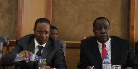 Interior Cabinet Secretary Fred Matiang'i and Principal Secretary Karanja Kibicho