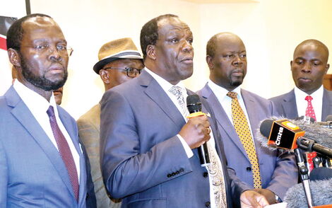From left: Kisumu Governor Anyang’ Nyong’o, Council of Governor chairman Wycliffe Oparanya and Trans Nzoia governor Patrick Khaemba address the press in Nairobi on December 16, 2019.