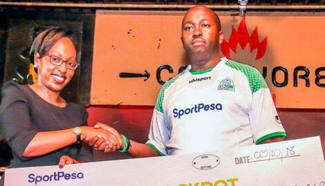 An undated image of newly elected Bomet County Assembly Speaker Cosmas Korir(right) shaking hands with Sportpesa official