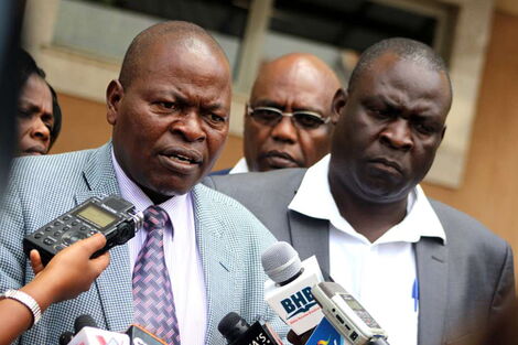 Kenya Union of Post Primary Education Teachers (Kuppet) Omboko Milemba (right) and Secretary General Akello Misori during a past address.