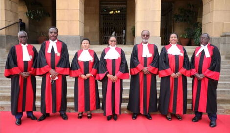 Lady Justice Martha Koome (center) and the other members of the Supreme Court bench.