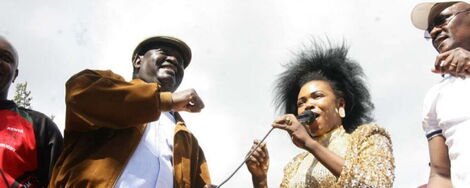 ODM leader Raila Odinga with the late Lady Maureen during a rally on September 7, 2014 in Kibra, Nairobi