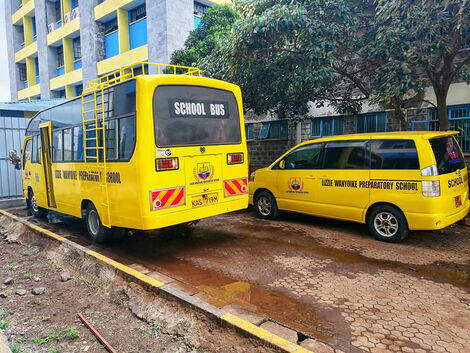 Lizzie Wanyoike Preparatory School buses at the school's parking lot.