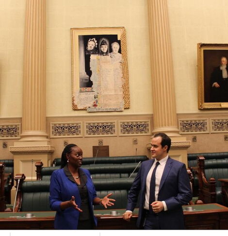 Lucy Gichuhi, Australia’s first black African born Member of Parliament posing with a colleague
