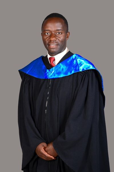 DCI Photographer Dominic Mwangi after his graduation on Wednesday, November 23, 2022