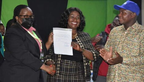 Machakos governor-elect Wavinya Ndeti second from left receiving his certificate in Machakos on August 13, 2022