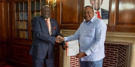 Education CS George Magoha handing over 2021 KSCE results to President Uhuru Kenyatta at State House Nairobi on April 23, 2022.