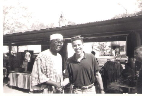 A rare photo of Malik Obama (left) with former US President Barack Obama