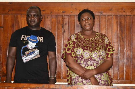 Malindi MP Aisha Jumwa (right) and her bodyguard Geoffrey Otieno Okuto appearing in court.