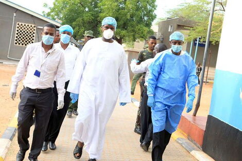 Mandera Governor Ali Roba (centre) and members of the county's medical team are pictured at the Mandera County Referral Hospital on April 1, 2020.