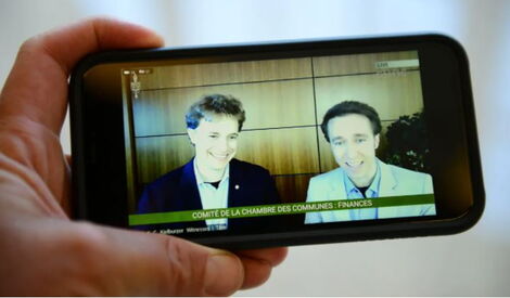 Marc Kielburger (left) and Craig Kielburger (right) appear on CBC TV in Canada on Thursday, November 18, 2021.