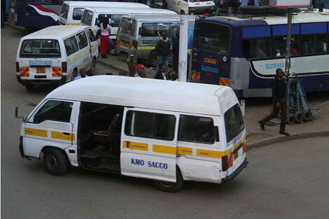 Matatus pictured at a terminus.
