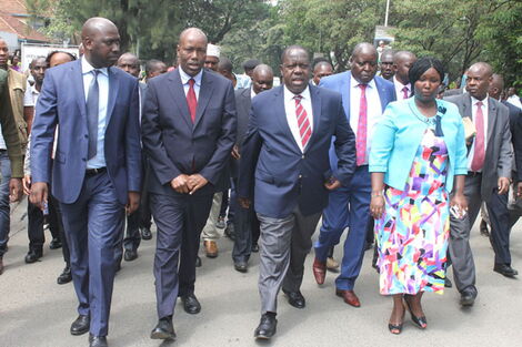 From left Nakuru Deputy Governor Eric Korir, Governor Lee Kinyanjui, Interior CS Fred Matiang'i and other officials following the launch of an e-passport centre in the county on June 12, 2019.