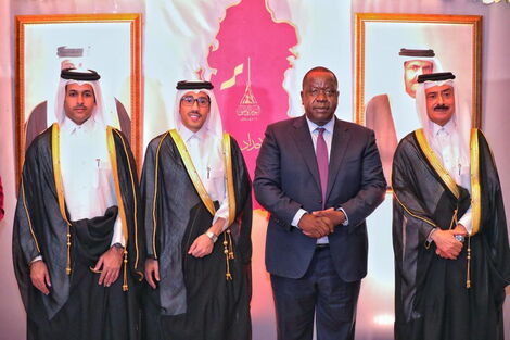 Interior CS Fred Matiang'i (second right) poses for a photo with Qatari officials during Qatar's National Day celebrations in Nairobi, on Friday, December 10, 2021