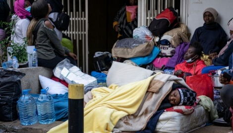 Kenyan migrant workers sleep outside Kenyan consulate in Badaro, Beirut on January 11, 2022
