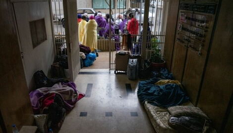 Kenyan migrant workers sleep outside Kenyan consulate in Badaro, Beirut on January 11, 2022
