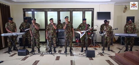Members of the Maroon Commandos performing their latest song titled Corona.