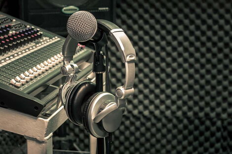 File image of a microphone in a recording studio