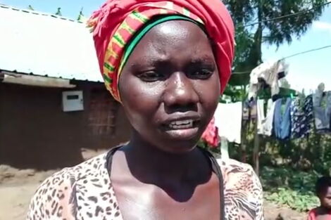 A photo of Milly Nafula taken at her workstation on December 7, 2021.