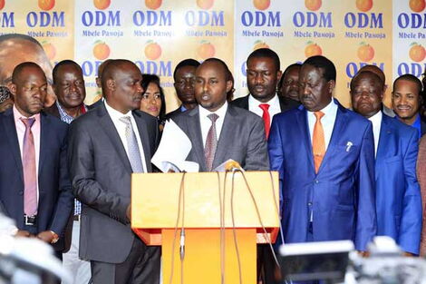 Minority Whip in the National Assembly Junet Mohammed (centre) ODM leader Rails Odinga (right) and the leader of the Minority in the National Assembly John Mbadi address the press at Orange House on March 18, 2018.