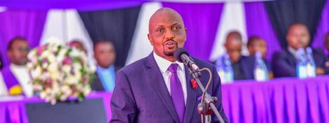 Trade CS Moses Kuria addresses mourners during his sister, Pauline Nyokabi Kuria's burial on Monday, January 23, 2023. 