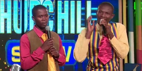 Comedians Gilbert ‘Mtumishi’ Baraza and Josephat ‘Mchungaji’ Muchesia performing on Churchill Show
