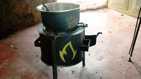 Mukuru Clean Stove inside a hut used for cooking