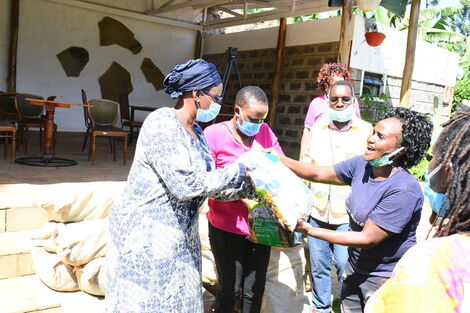 Murang'a Women Rep Sabina Chege distributing food to commercial sex workers on Monday, May 25