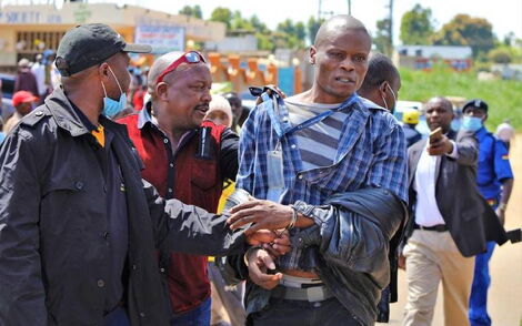 Daily Nation journalist Mwangi Muiruri handcuffed after altercation with security officers on November 14, 2021.