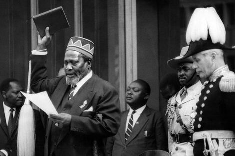 Mzee Jomo Kenyatta takes the oath of office during his swearing-in as Kenya's first Prime Minister on June 1, 1963 .jpg