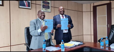 NPSC Chairman Eliud Kinuthia (left) and IG Hillary Mutyambai at his office.