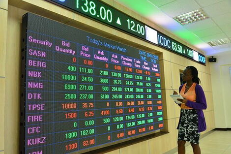 A trader monitors stocks at the Nairobi Securities Exchange.