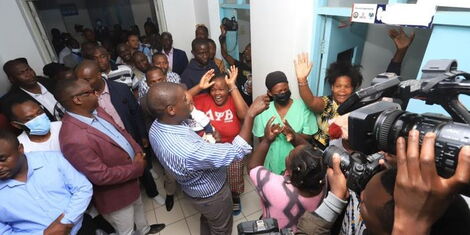 Nairobi City County Governor Johnson Sakaja communicates with patients during a visit to Mama Lucy Kibaki Hospital on Sunday, September 11, 2022.