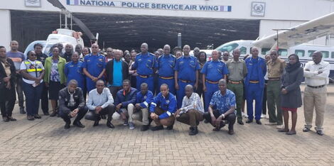 National Police Service Airwing pose for a photo with their new commandant Thomas Kabute