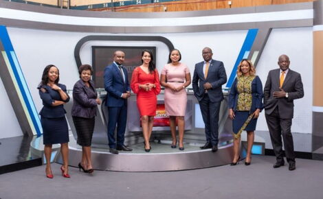 News anchors at KBC pose in the station's revamped studio.