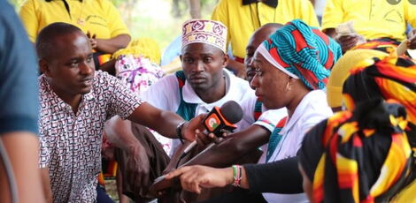 Citizen TV reporter, Nicky Gitonga interviews a section of Kwale County residents on May 21, 2021.