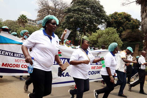 Nurses protest outside Afya House in Nairobi during a nationwide strike on September 11, 2017.