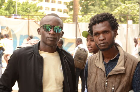 Shinaali Goodwin Lloyd (left) and Simon Nyakundi (right) pose for a photo in May 2022. 