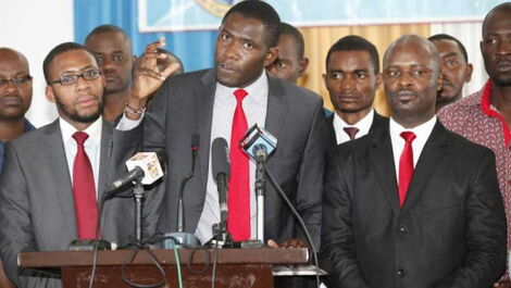 KMPDU secretary-general Dr. Ouma Oluga (centre) addresses journalists in 2017.