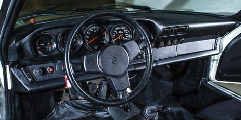 An interior of the 1984 Porsche 911 race car