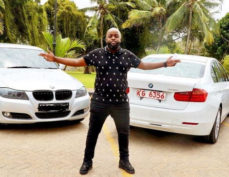 Patrick Mwangi Poses With Some of the Vehicles He Sell