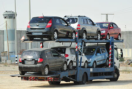 Personal Cars on a haulier truck