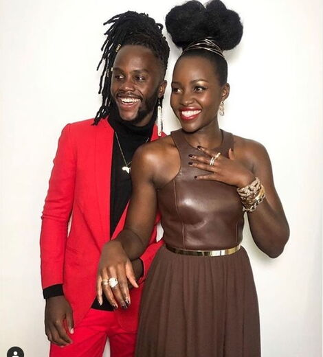 Peter junior Nyong'o and actress Lupita Nyong'o at the Critics Choice Awards on March 14, 2020. Peter's suit is courtesy of Narok NYC.