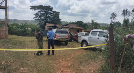 Police officer at the scene of the arson in Kandara, Murang'a County on Sunday, April 10, 2022.