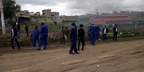 Police officers along Kangundo Road in Nairobi where a protest erupted on Thursday, October 29, 2020.