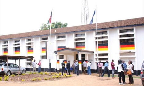 Police officers and citizens pictured outside Kasarani Police Station. Naomi Theuri reported that her father was missing at the station on May 18,2020.