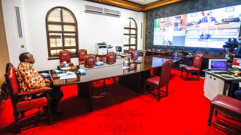 President Uhuru Kenyatta listens to submissions from other African leaders during the virtual African Union Peace and Security meeting on April 30, 2020.