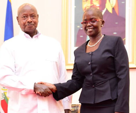 President Museveni shakes hands with Justice Jane Francis Abodo after her swearing ceremony as a High Court judge on March 23, 2018.