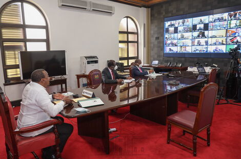 President Uhuru Kenyatta (Left) Council of Governors Chairman Wycliffe Oparanya and Health CS Mutahi Kagwe pictured during the Covid summit held on November 4, 2020.